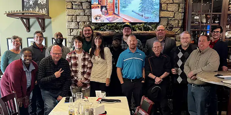 A group of employees gathered for the yearly Christmas lunch