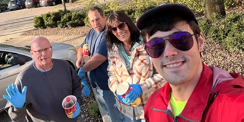 A group of people gathered to take part in a community service day