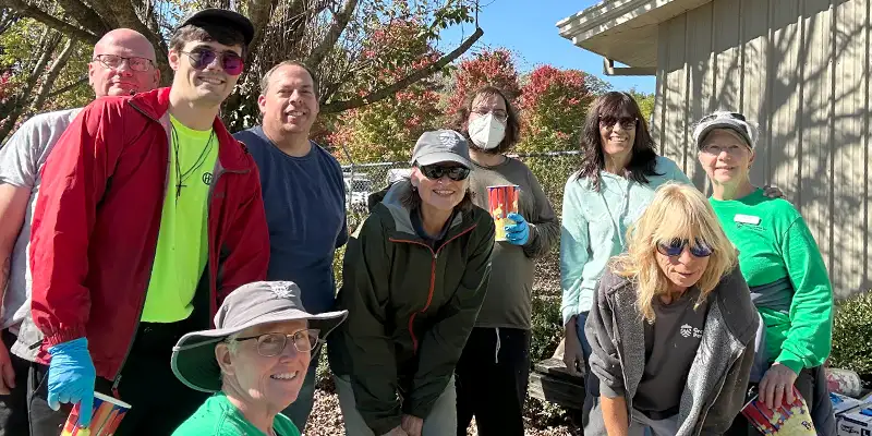 A group of people gathered to take part in a community service day
