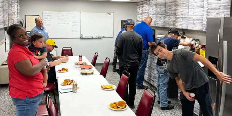HydraTech gathering for lunch in the break room