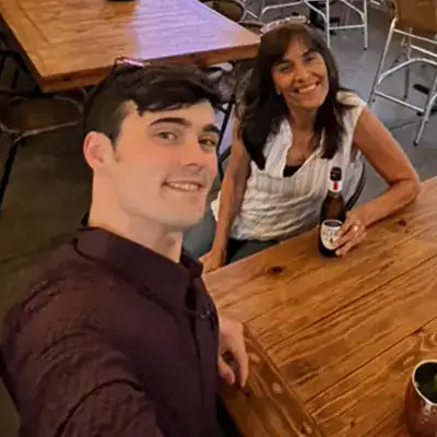 Caleb and Jennifer sitting at a table together