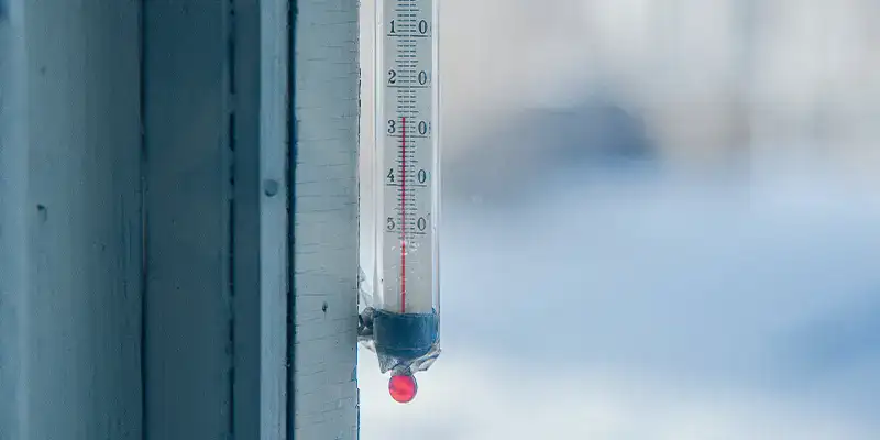 A thermometer outside on a cold day