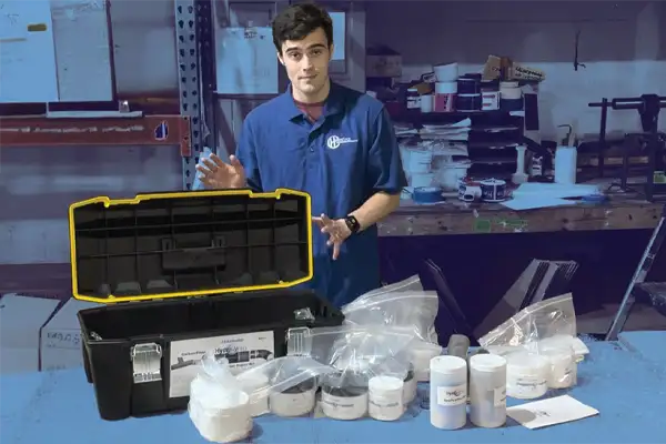 Caleb motioning to a universal Marine HydraWrap sitting on a table in front of him