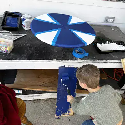 A young child painting