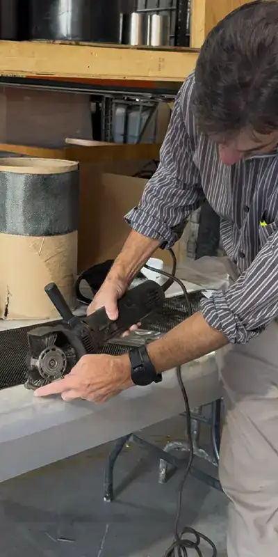 Demonstrating the parts of a grinder