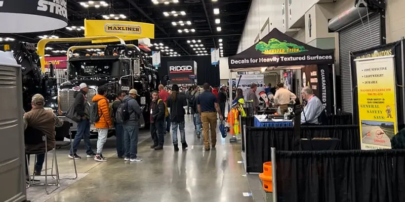 The WWETT tradeshow's exhibitor hall full of people