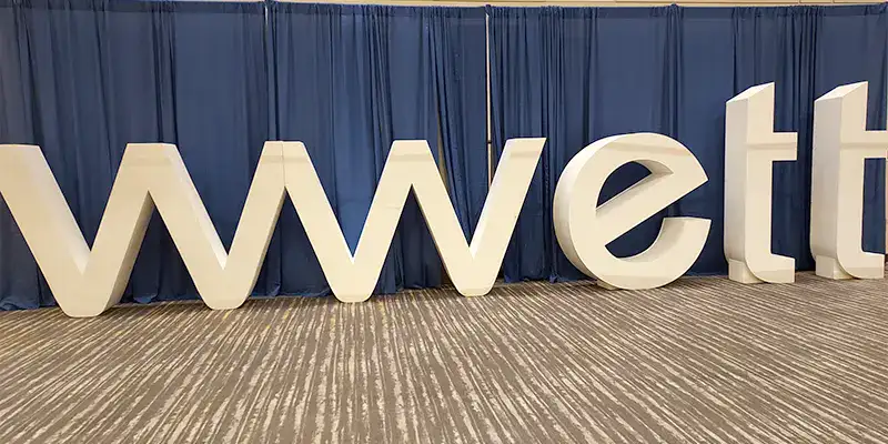 A large WWETT trade show sign