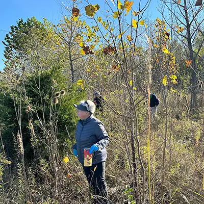 A woman standing in a field
