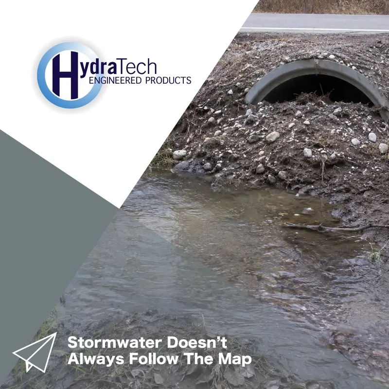 Water not going into a stormwater culvert due to debris build up at the mouth of the pipe