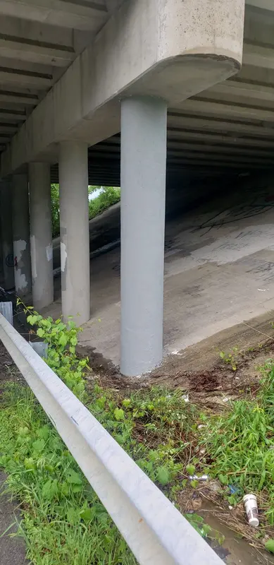 A bridge column that has been wrapped in carbon fiber