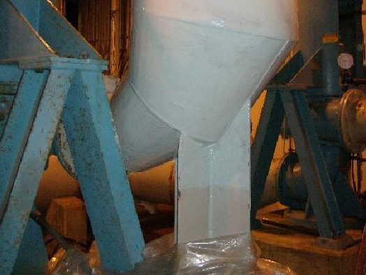 A large reducing elbow pipe coated in HydraLine epoxy