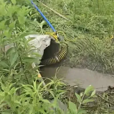 A culvert being cleaned out with a jetter vac