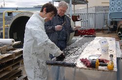 Saturating the carbon fiber fabric in resin in preparation for a HydraWrap application