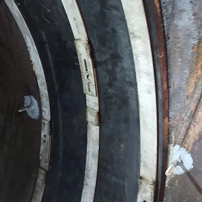 Studs installed on either side of a HydraTite internal pipe joint seal that is installed atop a penstock pipeline joint