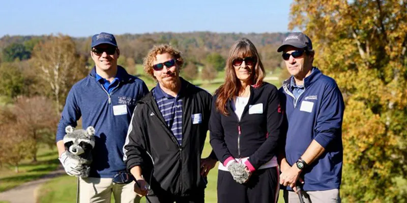 A group of HydraTech Employees together to golf at a construct connect event